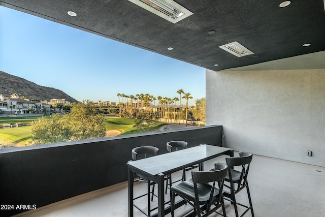 balcony featuring a mountain view