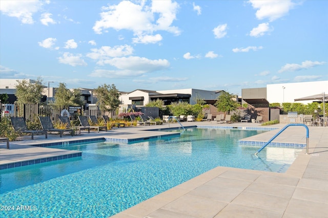 view of swimming pool featuring a patio area