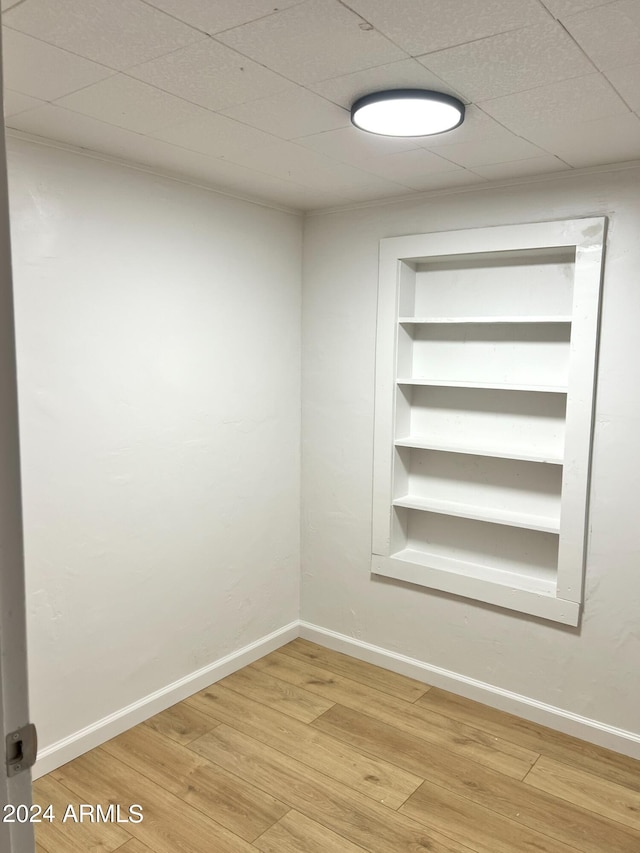 unfurnished room featuring hardwood / wood-style floors