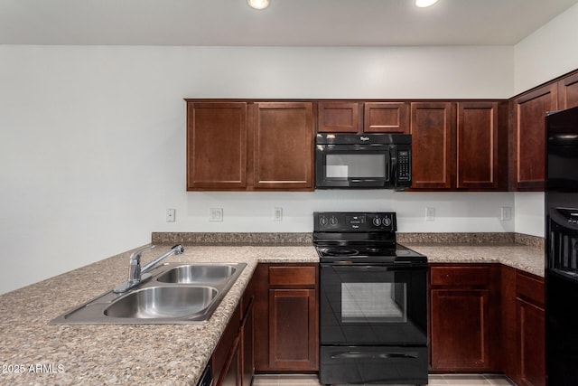 1950 N Center St Unit 115, Mesa, AZ 85201 - kitchen featuring black appliances, a sink, recessed lighting, and a peninsula