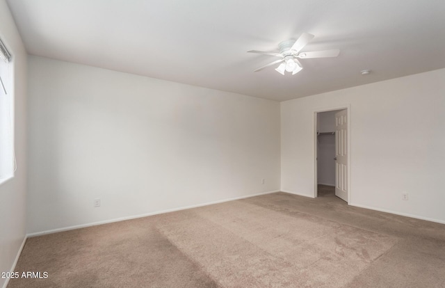 1950 N Center St Unit 115, Mesa, AZ 85201 - unfurnished bedroom with light colored carpet, baseboards, and a walk in closet