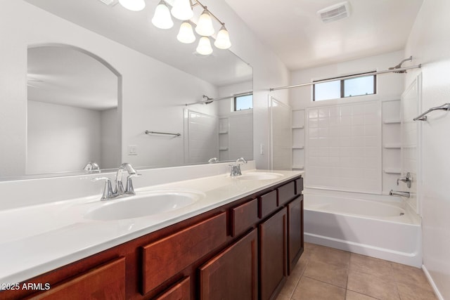 1950 N Center St Unit 115, Mesa, AZ 85201 - bathroom with shower / washtub combination, tile patterned flooring, double vanity, and baseboards