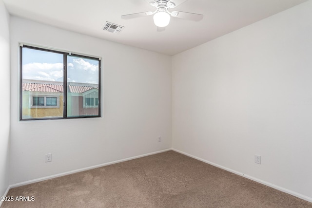 1950 N Center St Unit 115, Mesa, AZ 85201 - carpeted spare room featuring baseboards and a ceiling fan
