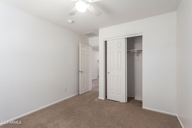 1950 N Center St Unit 115, Mesa, AZ 85201 - unfurnished bedroom with carpet flooring, a closet, ceiling fan, and baseboards