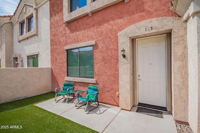 1950 N Center St Unit 115, Mesa, AZ 85201 - property entrance featuring fence and stucco siding