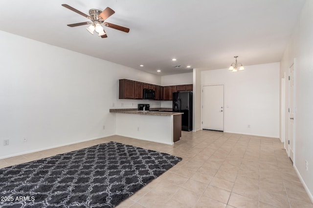 1950 N Center St Unit 115, Mesa, AZ 85201 - kitchen with black appliances, light tile patterned floors, dark brown cabinetry, a chandelier, and open floor plan