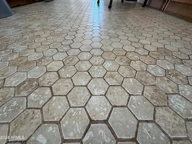 details featuring tile flooring and walk in shower