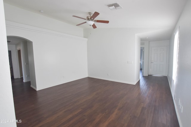 unfurnished room featuring ceiling fan and dark wood-type flooring