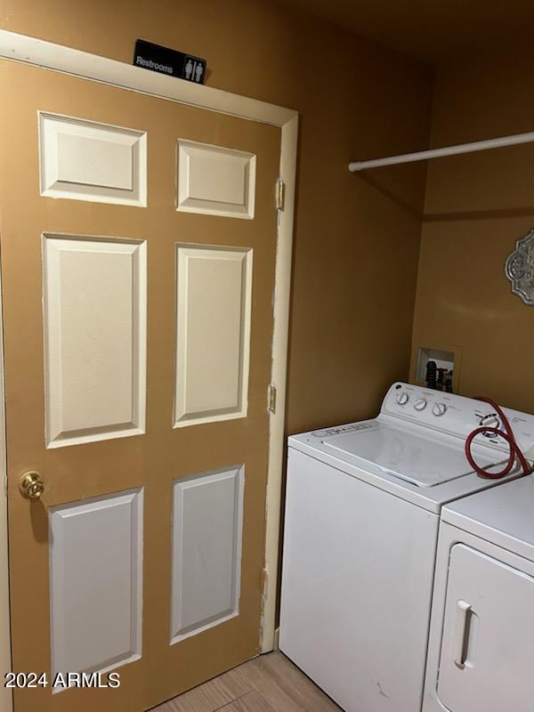 laundry area featuring washing machine and clothes dryer