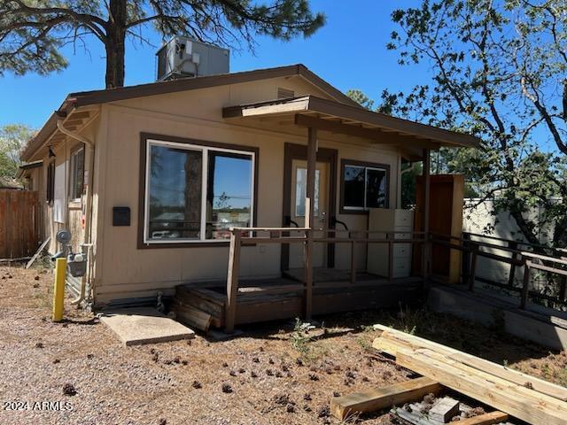 view of front of house featuring a wooden deck