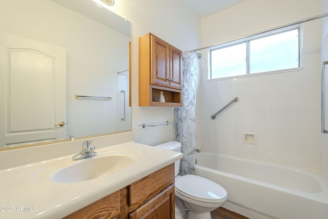 full bath with vanity, toilet, and shower / tub combo with curtain