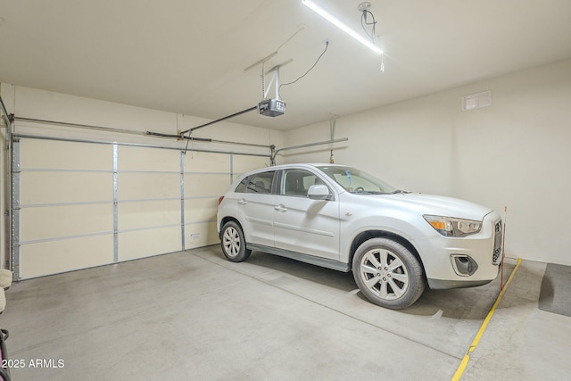 garage with a garage door opener