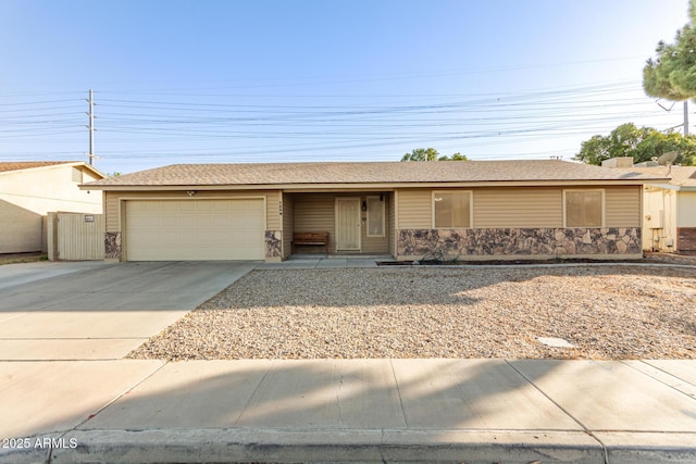 single story home with a garage