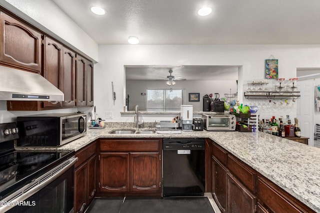 kitchen featuring sink, ceiling fan, dark brown cabinets, stainless steel appliances, and light stone counters