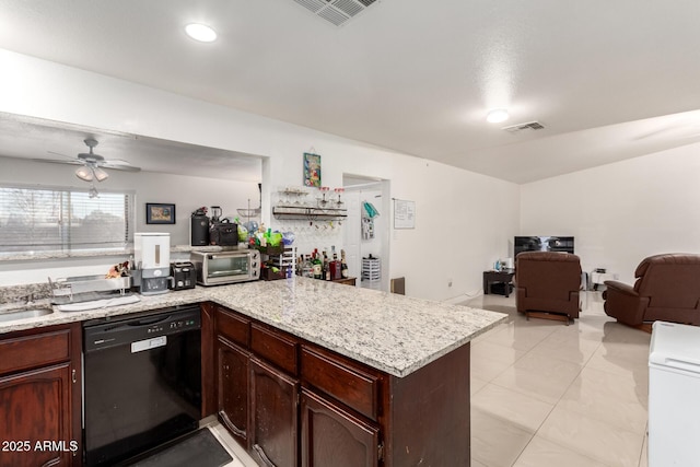 kitchen featuring ceiling fan, sink, kitchen peninsula, and black dishwasher