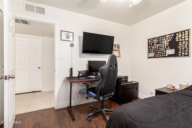 bedroom featuring hardwood / wood-style floors