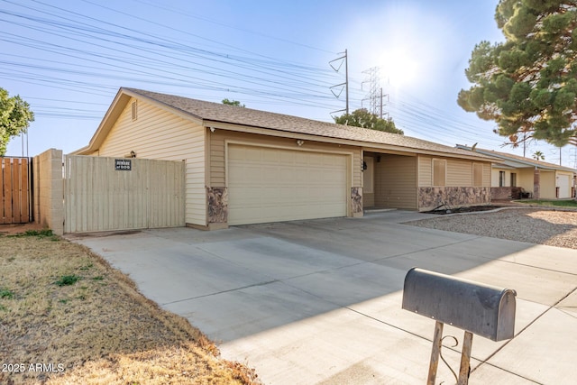 ranch-style home with a garage