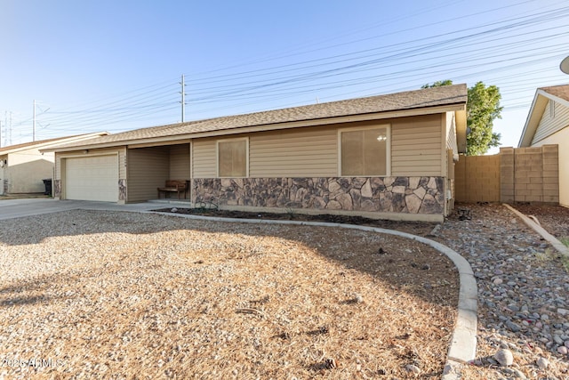 single story home with a garage