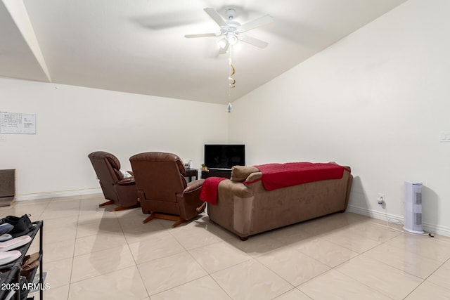 tiled living room with vaulted ceiling and ceiling fan