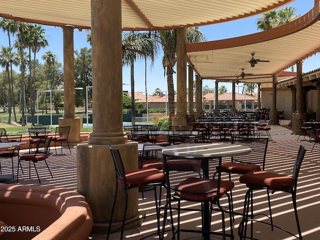 view of patio with ceiling fan