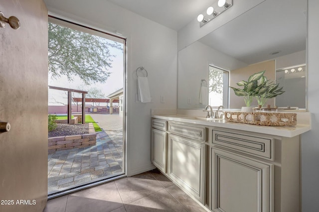 bathroom featuring vanity and tile patterned flooring