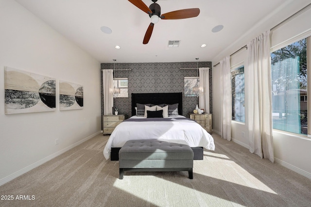 carpeted bedroom featuring ceiling fan