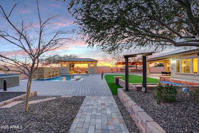 view of property's community featuring an outbuilding, a swimming pool, and a patio