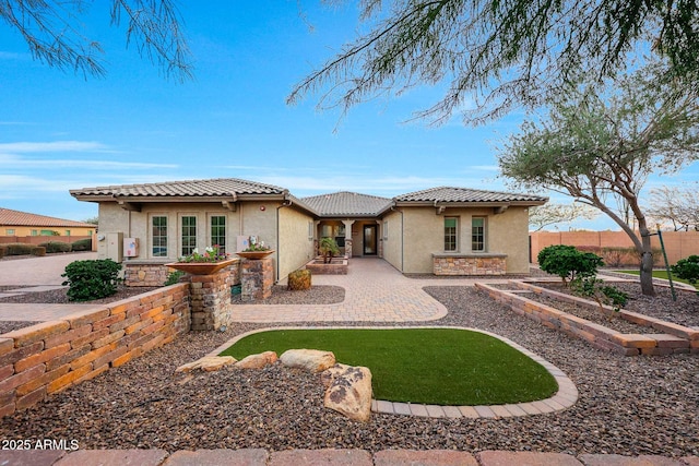 back of property with a patio area