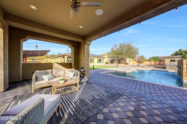 view of swimming pool with an outdoor living space, a patio, ceiling fan, and a pergola