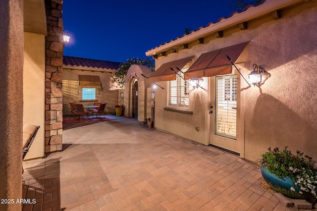 view of patio at twilight