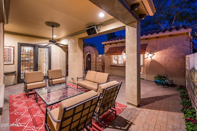 view of patio featuring an outdoor living space, french doors, and ceiling fan