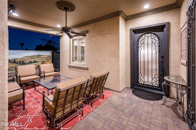 view of patio / terrace featuring an outdoor living space and ceiling fan