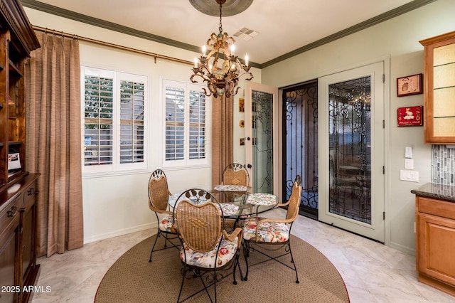 dining room with visible vents, baseboards, ornamental molding, a notable chandelier, and marble finish floor