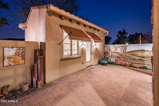 view of patio at night