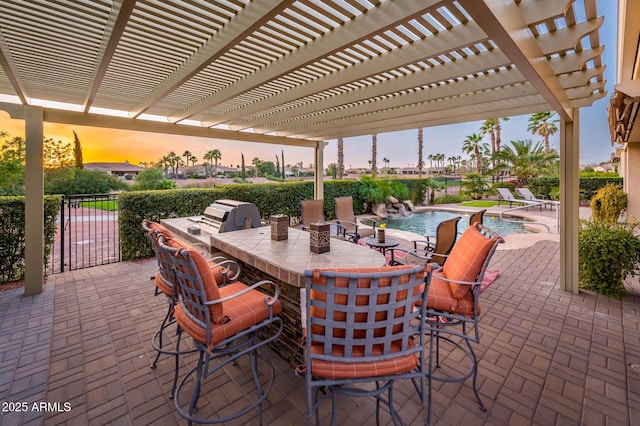 view of patio / terrace with outdoor dry bar, a fenced in pool, a pergola, and fence