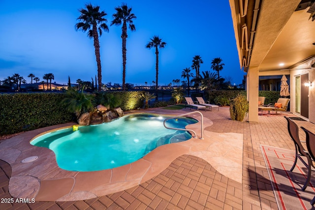 view of pool featuring a fenced in pool and a patio