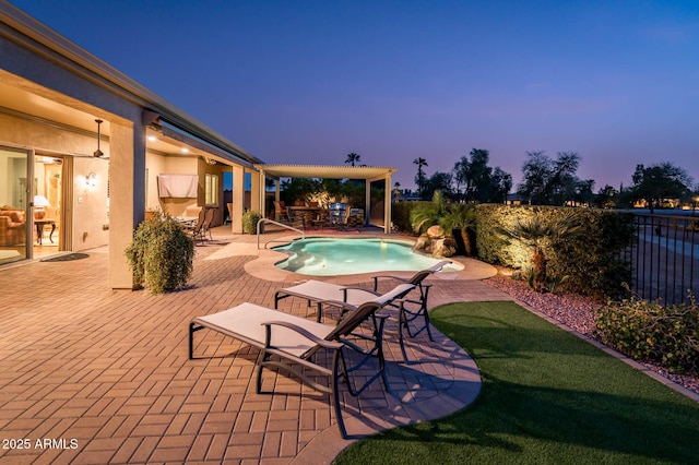 view of swimming pool with a patio area, outdoor dining space, a fenced in pool, and fence