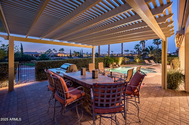 view of patio with fence, a fenced in pool, a pergola, and outdoor dry bar