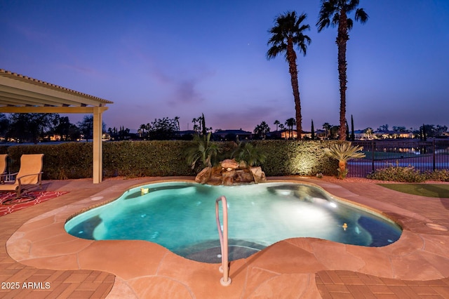 view of pool with fence