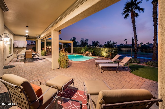 view of patio featuring a fenced in pool, outdoor dining area, and a fenced backyard