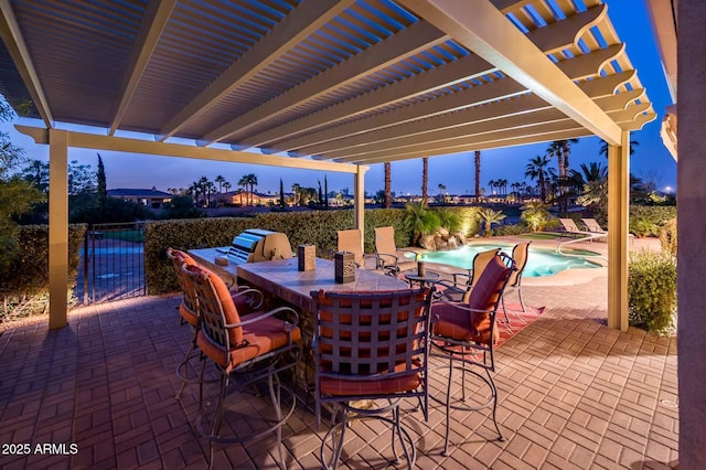 view of patio / terrace with a fenced in pool, fence, and a pergola