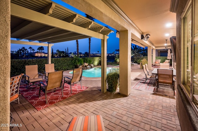 view of patio / terrace featuring an outdoor pool, a pergola, and outdoor dining area