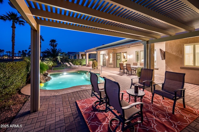 pool featuring a patio area and a pergola