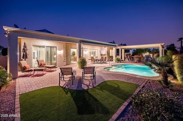 outdoor pool with a pergola and a patio