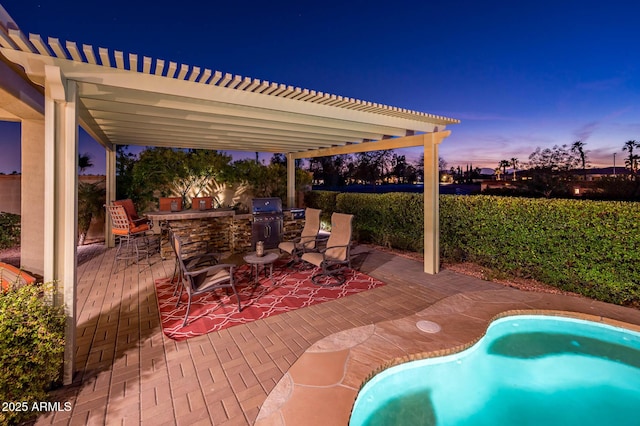 view of patio featuring outdoor dining space and a pergola