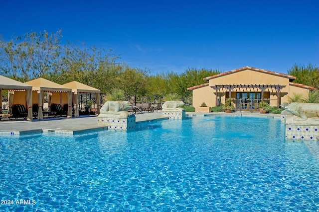 view of pool featuring a patio area and a gazebo