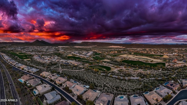 aerial view at dusk with a mountain view