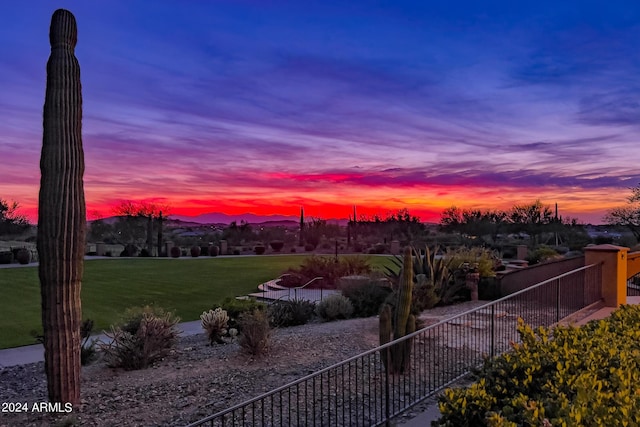 yard at dusk with a mountain view