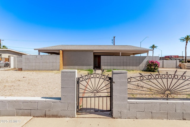 5902 W Orange Dr, Glendale, AZ 85301 - view of front facade with a gate, a fenced front yard, and stucco siding