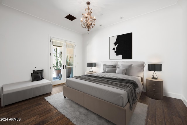 bedroom featuring a notable chandelier, dark hardwood / wood-style floors, access to outside, and french doors